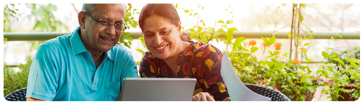 Couple looking at a tablet