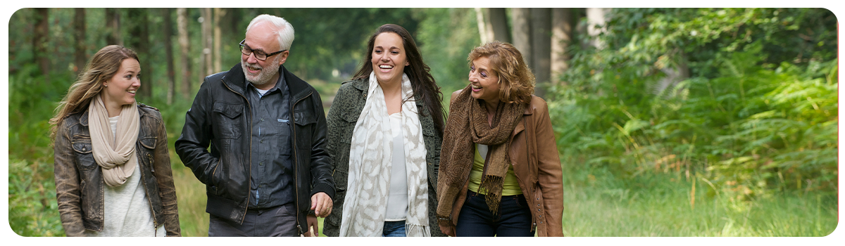 family_walking_woods