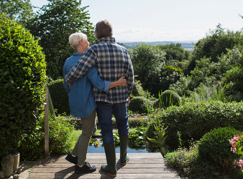 happy_couple_looking_over_gardens