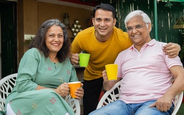 Parents enjoying coffee with their son